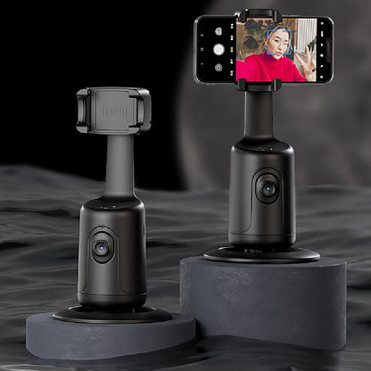 Black smartphone gimbal with smartphone displaying a video call on a dark background