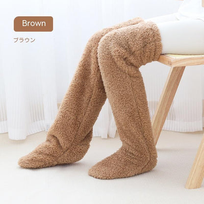 Brown fuzzy knee-high socks on a white background