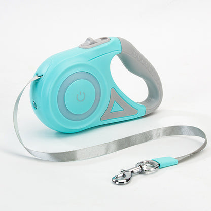 Turquoise retractable dog leash with gray handle on a white background